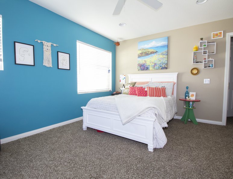 Newly built bedroom with white wood closet sliding doors