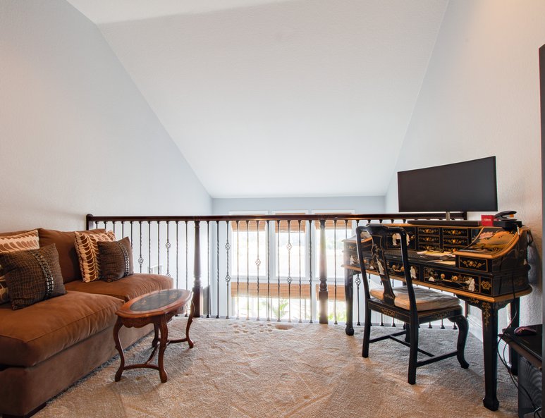 Open loft with dark railing