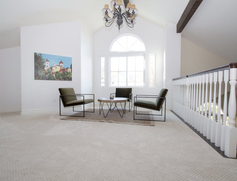 Open loft space used as a sitting area.