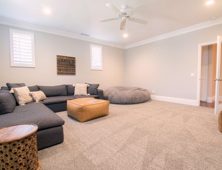 Newly added family room with ample lighting.