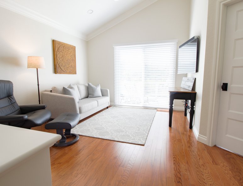 Open loft with sitting area and built in desk