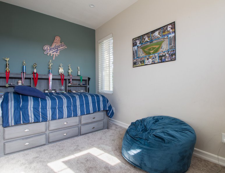 Bedroom with ample lighting.